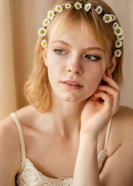 Free Photo Beautiful Woman Posing While Wearing A Spring Flowers Crown
