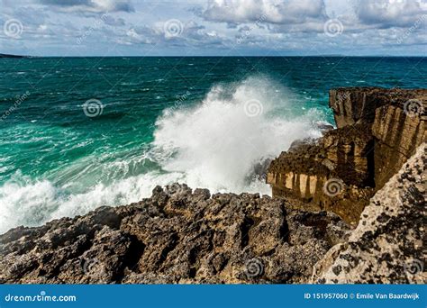 View Of The Waves Crash On The Rocks Of Limestone Coastal Cliff In