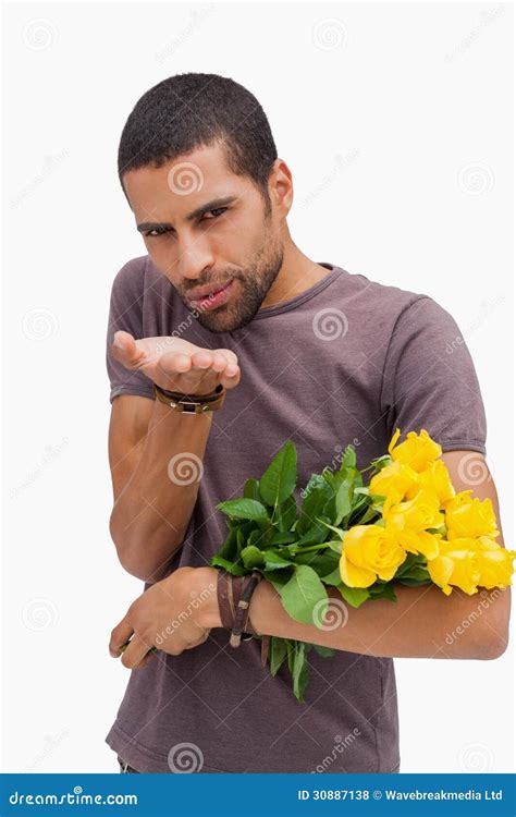 Handsome Man Blowing A Kiss And Holding Roses Stock Photo Image Of