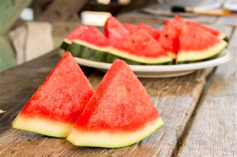 Premium Photo Seedless Watermelon Cut Into Wedges Serving On Dish