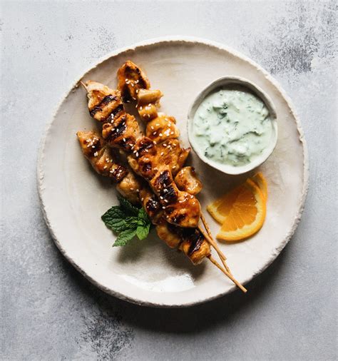 Prepare a batch of sushi rice, and enlist help in chopping or shredding vegetables like cucumber, carrots, and radishes.when guests arrive, have a few rolling stations set up with rice, nori (seaweed), mats wrapped in plastic, and water for sealing the rolls, easier spreading of rice and cleaning hands. Orange Chicken Skewers with Jalapeño-Mint Yogurt Dip ...