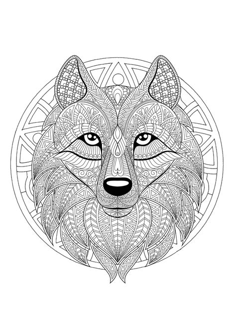 It's easy to get quiet and contemplate. Mandala with geometric patterns and Wolf head full of ...