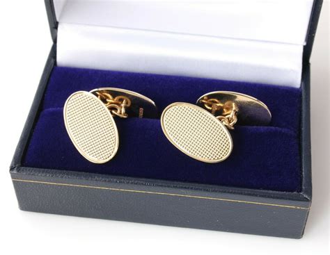 Pair Of Solid 9ct Gold Oval Cufflinks In T Box One Plain And Engine