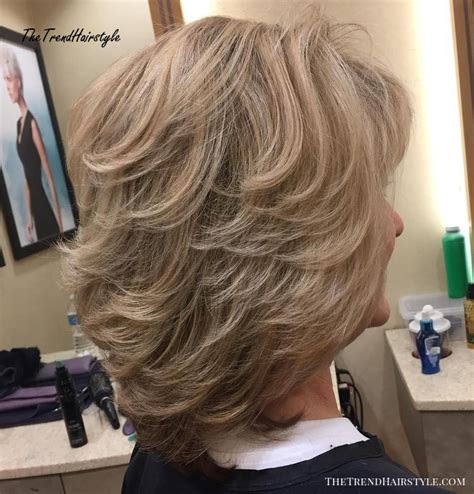 These styles are suitable for both fine and thick hair. Tousled Blonde Highlights - 20 Flattering Medium-Length Haircuts for Women Over 50 - The ...