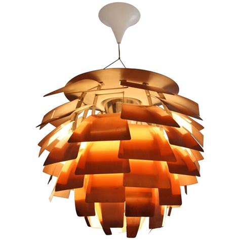 The ph artichoke was designed in 1958 by poul henningsen for the langelinie pavillonen, a modernist copenhagen restaurant where it continues to enchant visitors today. Louis Poulsen Artichoke Lamp by PH c.1960, Diam 84cm at 1stdibs