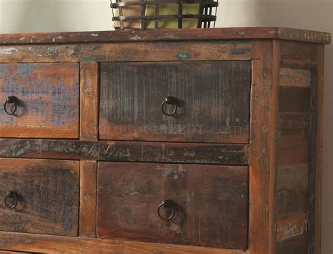 The point is to use accent cabinets and chests for both visual interest and for storage solutions. 950365 Accent Cabinet by Coaster in Reclaimed Wood
