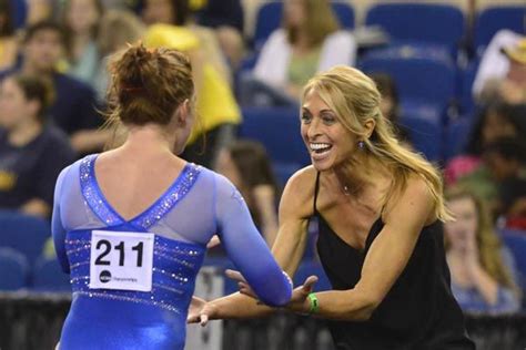 Uf Coach Rhonda Faehn Congratulates Bridget Sloan After A Routine In
