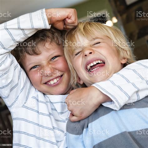 Two Young Brothers Fighting Stock Photo - Download Image Now - iStock