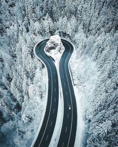 Winding Roads Snow Covered Forests And Frozen Lake Beautiful Roads