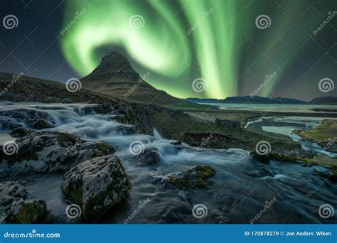 Northern Lightsaurora Borealis Over The Famous Mountain Kirkjufell And