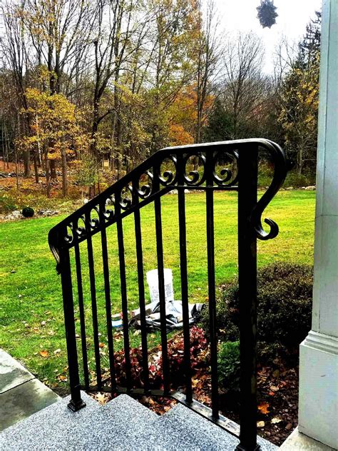 If you have pavers or bricks on the ground under your steps, take these up so you can dig the holes for the upright posts. 3-Rail Wrought Iron Railing with Decorative Fishtail Rings ...