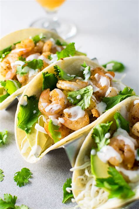 spicy shrimp tacos  creamy lime sauce kitchen swagger