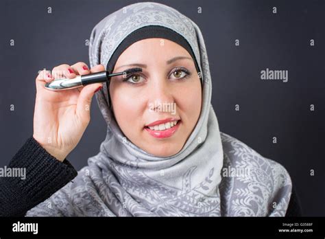 Beautiful Muslim Woman Applying Mascara Stock Photo Alamy