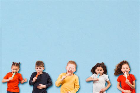 Kids Eating Popsicles And Laughing Church Stock Photos