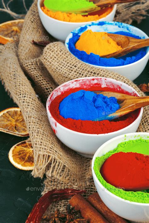 Traditional Indian Holi Colours Powder Spices On Dark Rustic