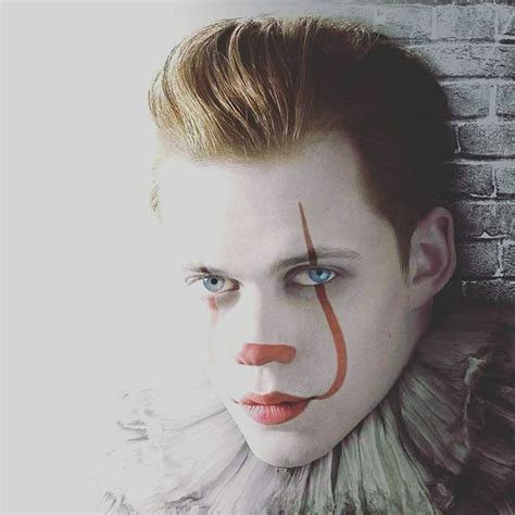 A Man With Clown Makeup On His Face Next To A Brick Wall