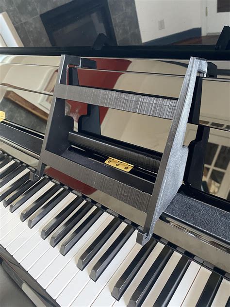 Made this laptop stand for my upright piano so I can read digital sheet