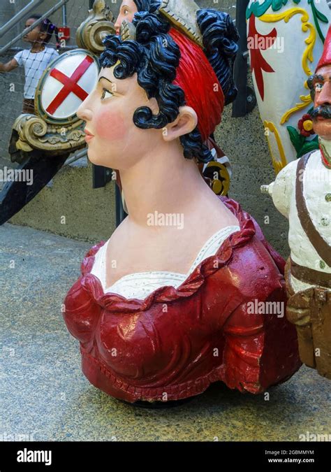 display of traditional figureheads in the cutty sark a british clipper ship and popular tourist