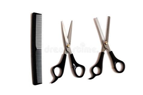 Professional Hairdresser Scissors And Comb Isolated On White Background
