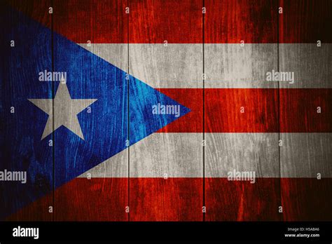 Flag Of Puerto Rico Or Puerto Rican Banner On Wooden Background Stock