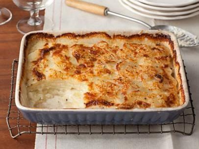 If you enjoy scalloped potatoes but want a rich cheesy topping, make au gratin potatoes. Scalloped Potato Gratin | Recipe in 2020 | Food network ...