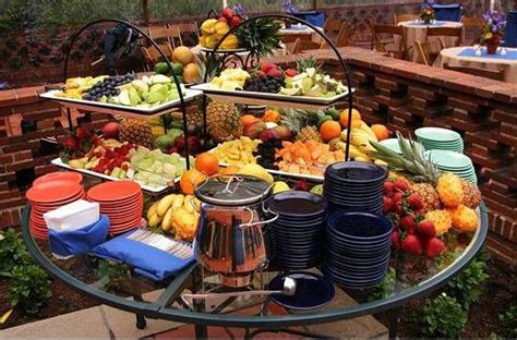 A large wedding menu with ribbons and calligraphy will act as a wedding sign and decoration. A great way to set up a backyard buffet for an informal ...