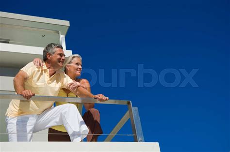 older couple relaxing at home stock image colourbox