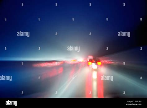 Cars On Highway At Night During Rain Storm Usa Stock Photo Alamy