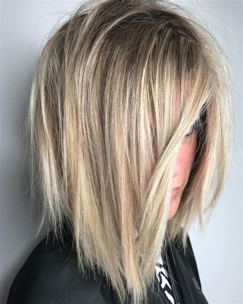 A layered hair cut creates different lengths of strands throughout the. Chic ️texture | Layered haircuts shoulder length, Hair ...