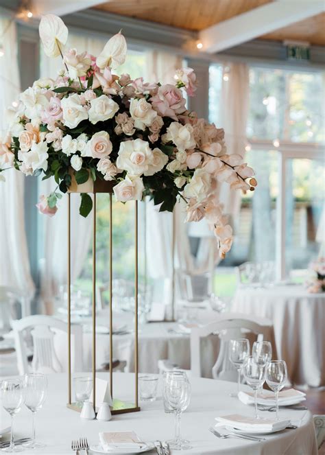 Tall Centerpieces That Will Take Your Reception Tables To New Heights Martha Stewart Weddings
