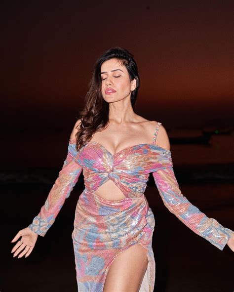 sonnalli seygall in this cleavage baring stylish outfit flaunted her sexy legs on the beach