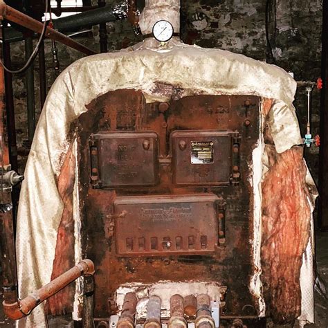 Spooky Basements Check Out This Old Boiler In Our House Rcenturyhomes