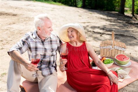 Aged Married Couple Feeling Amazing While Having Weekend Picnic Stock