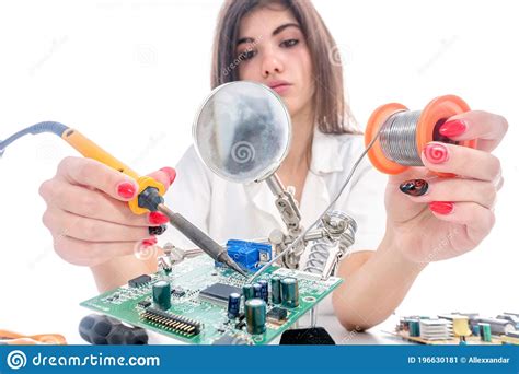 Woman Electronic Technician Repair Electronic Equipment Using Electric