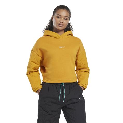 サーモウォーム グラフェン フーディー Thermowarmgraphene Hoodie （ブライトオークル） Reebok 公式