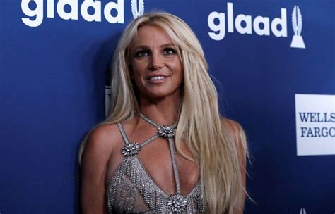 Britney Spears Strips Topless As She Poses In Just A Sheet For Racy