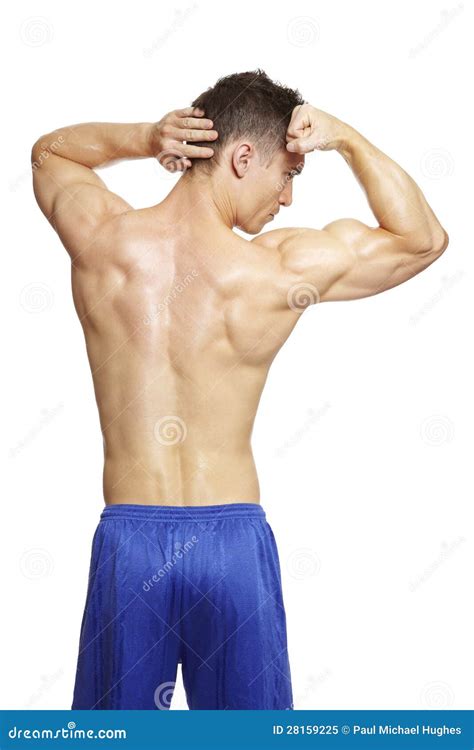 Muscular Young Man Flexing Arm In Sports Outfit Stock Image Image