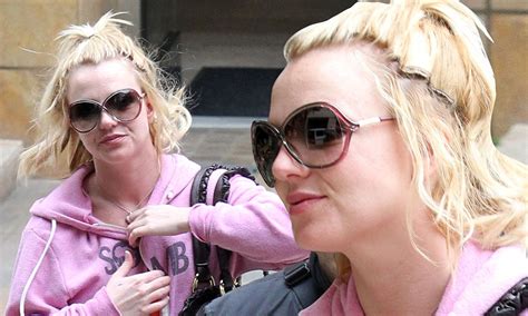 Britney Spears Displays Ragged Extensions With Pulled Back Hairstyle