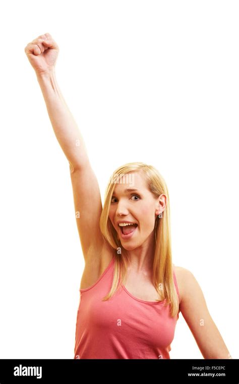 Happy Woman Cheering With Her Clenched Fist Stock Photo Alamy