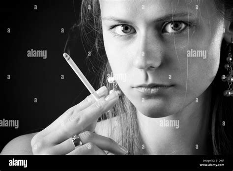 Pensive Young Woman Smoking Cigarette Black And White Stock Photos