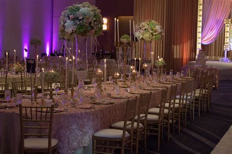 A Gorgeous Vip Table Highlighted With Lush Florals And Specialty Linen