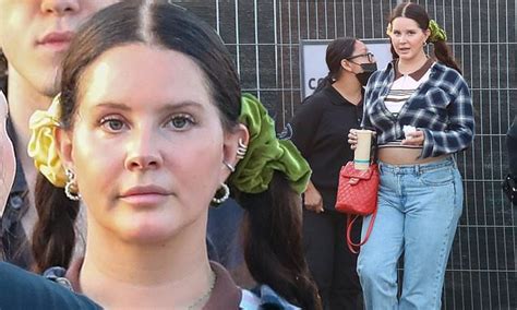 Lana Del Rey Cuts A Casual Figure In A Blue Cropped Flannel As She