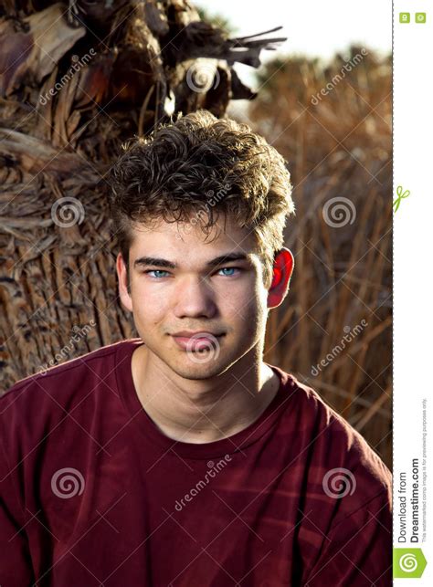 Head Shot Teen Boy In Maroon Stock Image Image Of Handsome