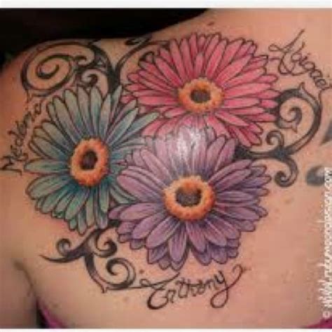 Gerber Daisy Tattoo Want To Add This To The Top Of My Foot Minus The Scroll And Names