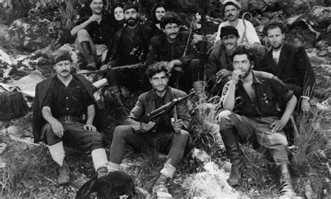 A British Soe Agent Poses With A Group Of Partisans On Crete During The