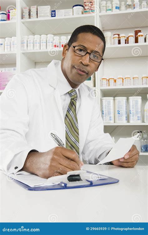 Male Pharmacist Working In Pharmacy Stock Image Image Of Labcoat