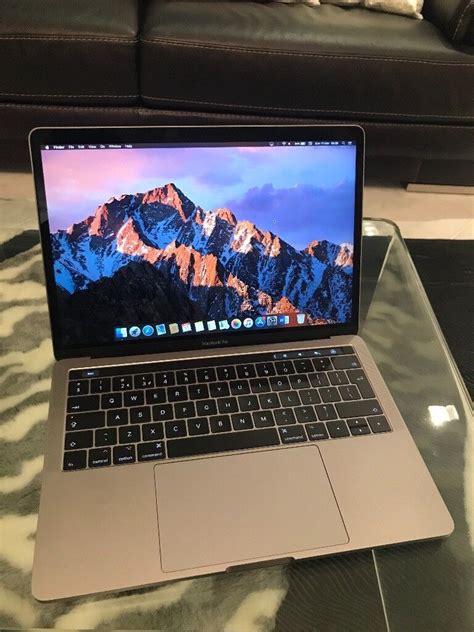Macbook Pro 2017 Touch Bar Homecare24