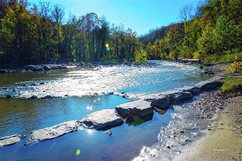 The Patapsco River With Sunlight Reflections And Sun Flares Large Flat