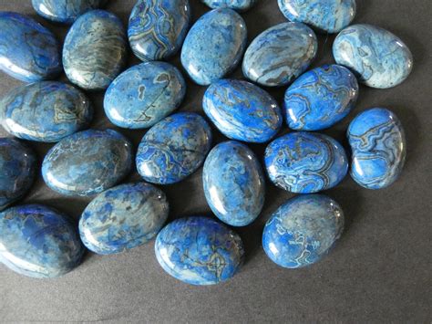 25x18mm Natural Ripple Jasper Cabochon Dyed Blue And Black Oval