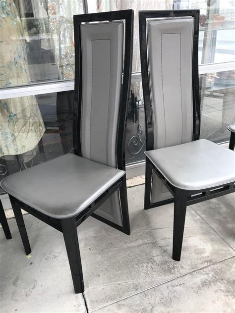 In the living room, position a couple of matching chairs directly across from the. Set of Six Italian Modern Black Lacquer and Grey Leather ...